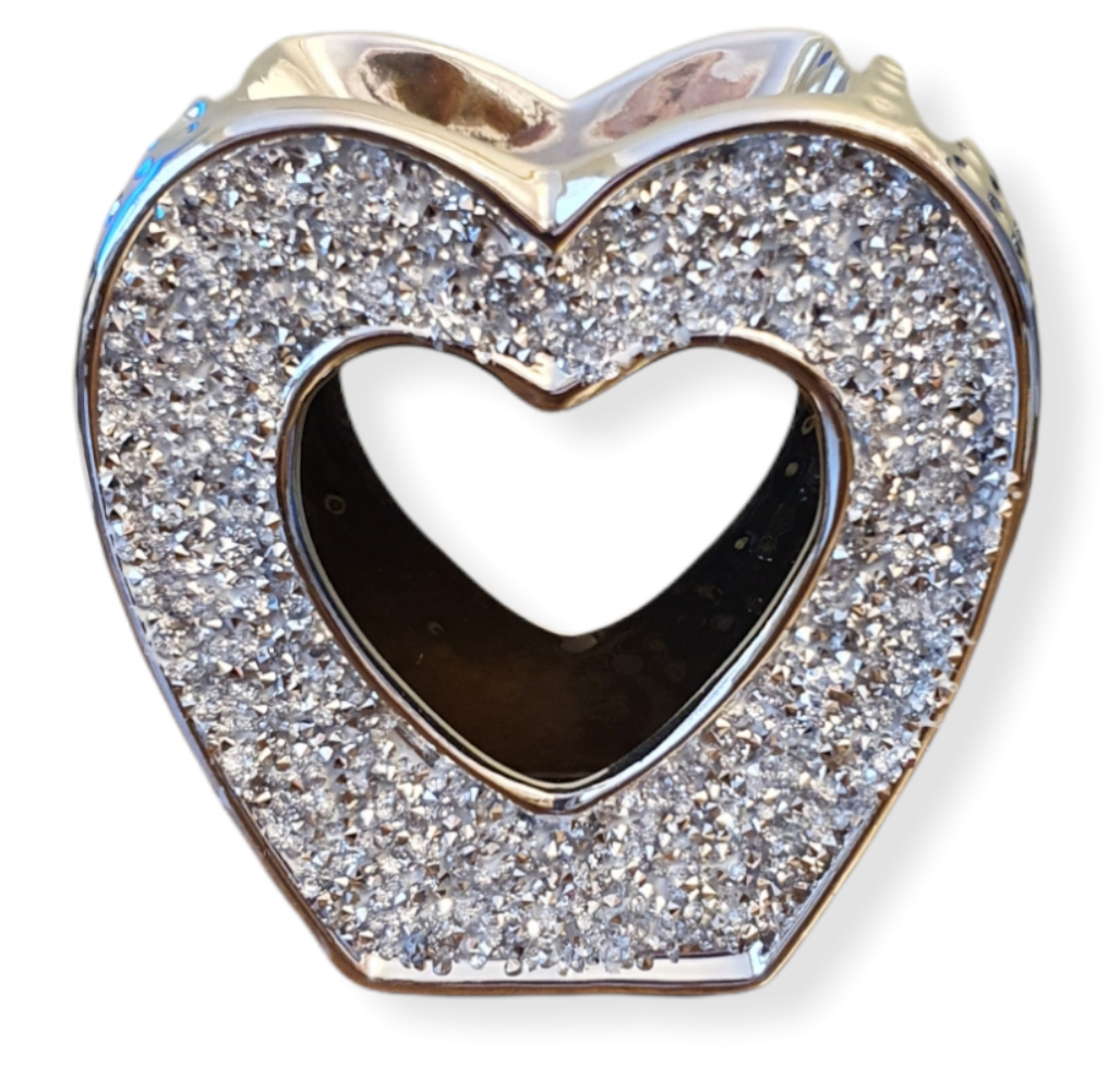 Sparkly silver heart shaped wax warmer.