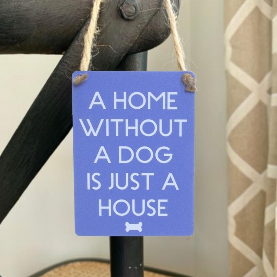 Small blue hanging sign, white text ' A HOME WITHOUT A DOG IS JUST A HOUSE', small dog bone in white.