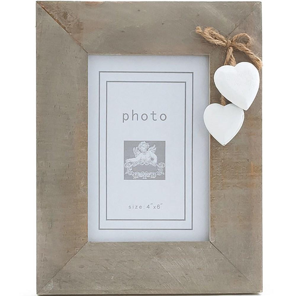 Rectangle driftwood style photo frame that has 2 small white hearts attached. by jute string.