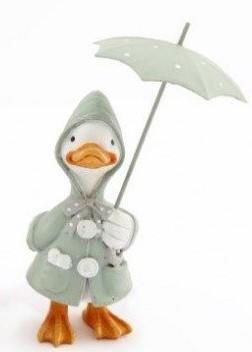 Standing metal white duck, orange nose, orange web feet, sage green rain coat, hood up holding sage green opened umbrella.