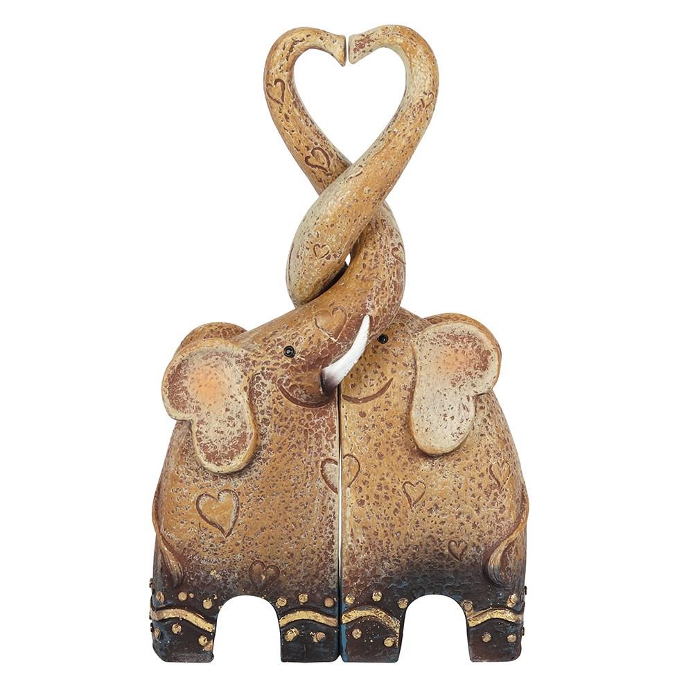 Two light brown elephants together, trunks entwinned forming heart shape. Dark brown feet.a