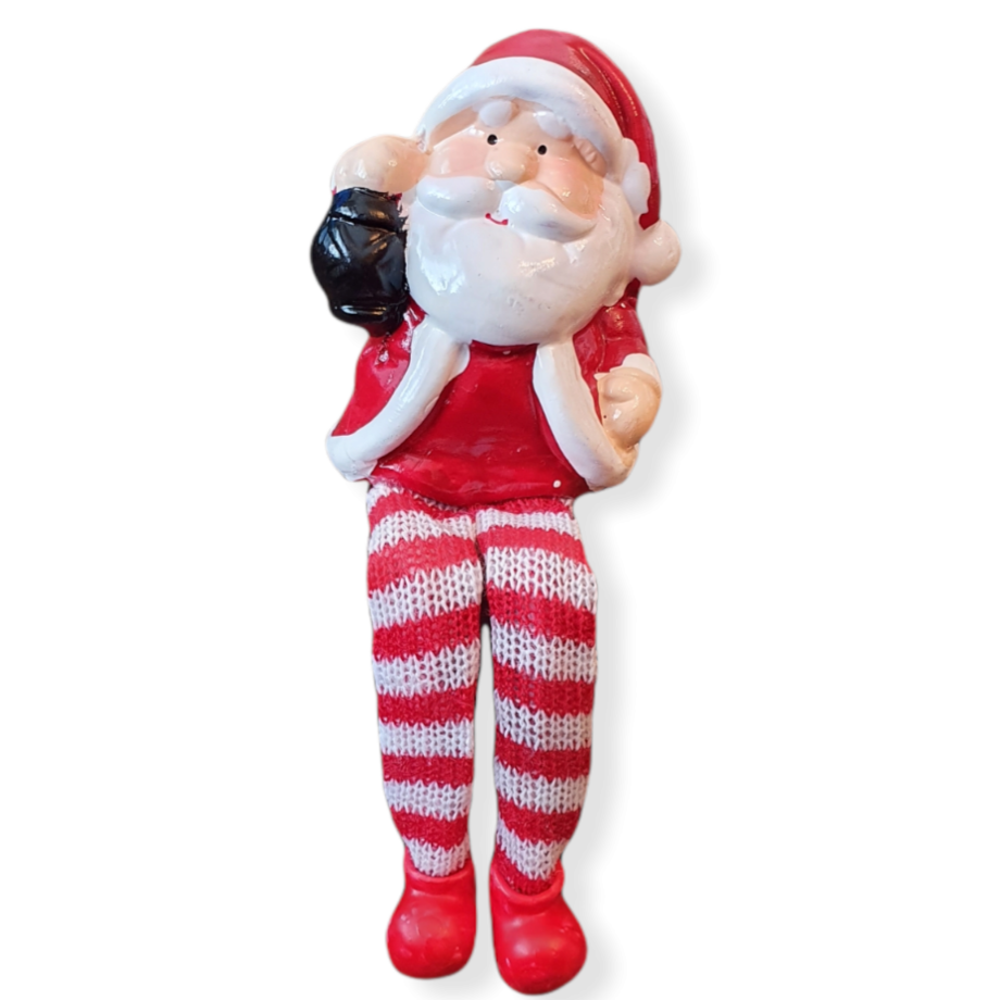 Sitting santa with ceramic body, cloth red and white stripe hanging legs and red ceramic boots .