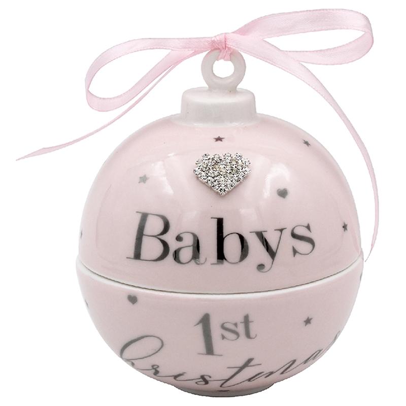 Pale Pink bauble, diamanté heart embellishment,  Silver writing ' Baby's first Christmas', silver little hearts and silver stars around bauble, pink ribbon on very top.