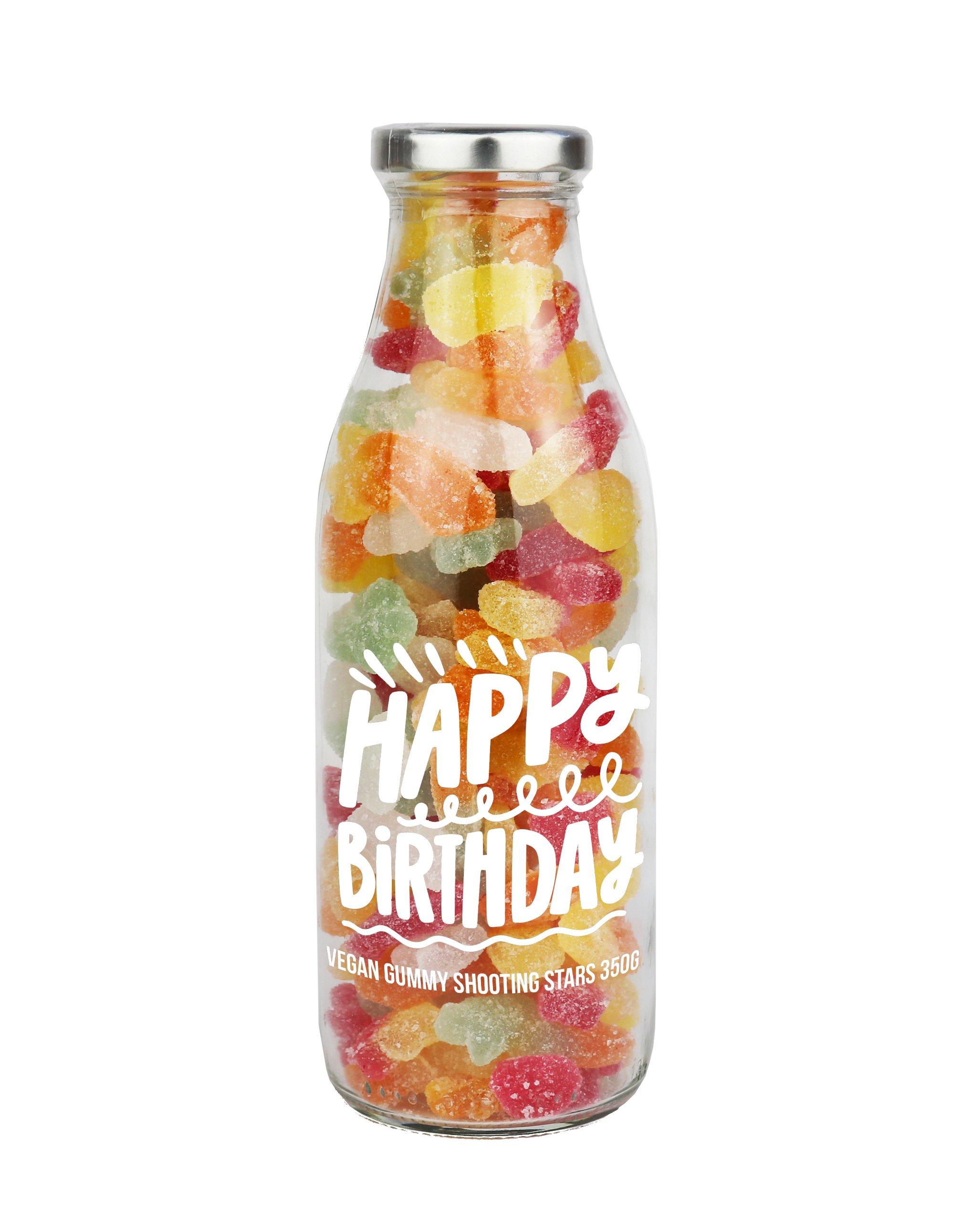 Milk bottle full of multi colour star gummy sweets, white happy birthday label on bottle , chrome colour lid.