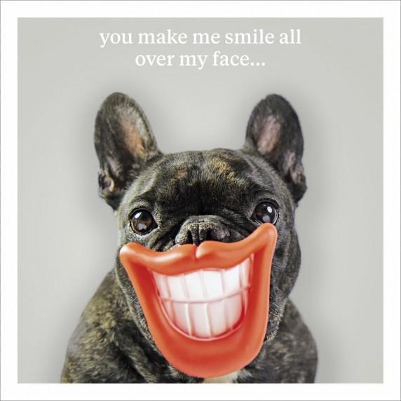 French Bulldog with big Red lips wide smile showing white teeth, white text reads ' you make me smile all over my face'.