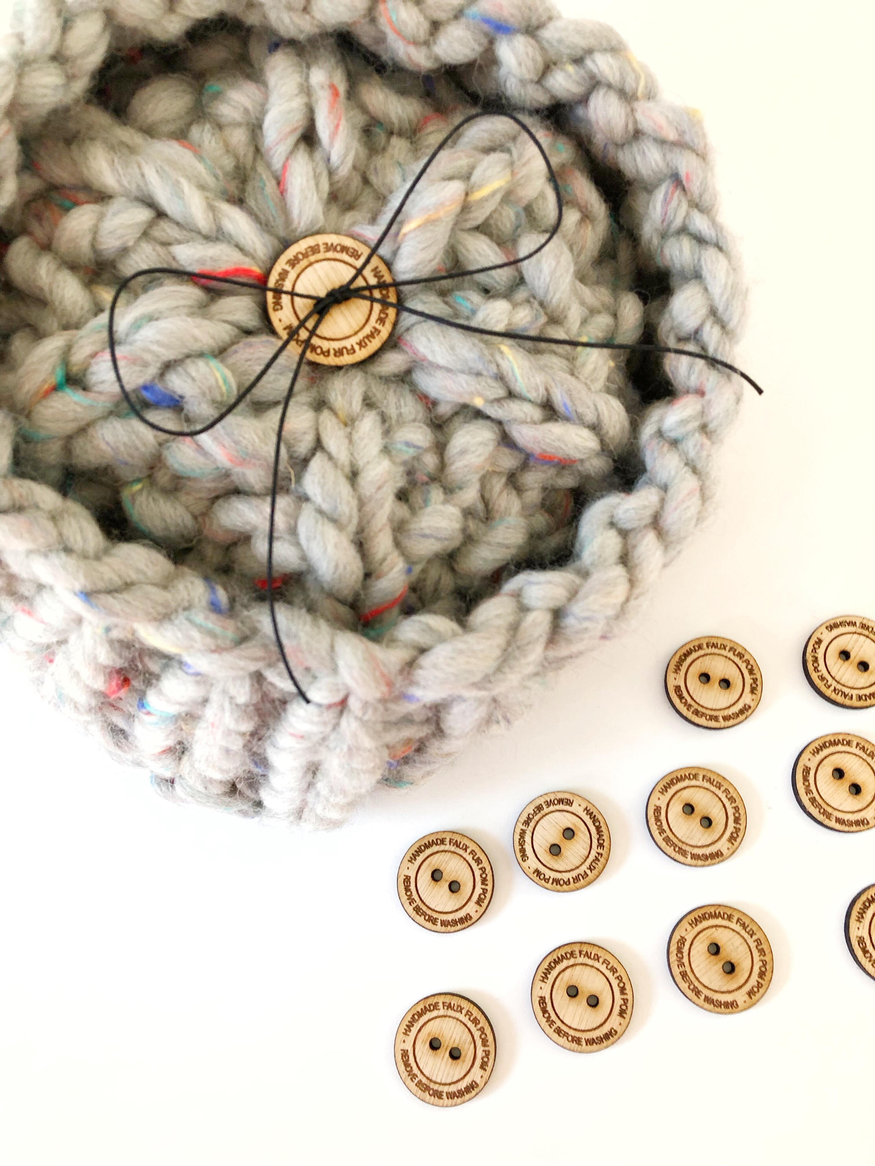 Small wooden buttons ideal for attaching faux fur pom poms to knit and crochet hats