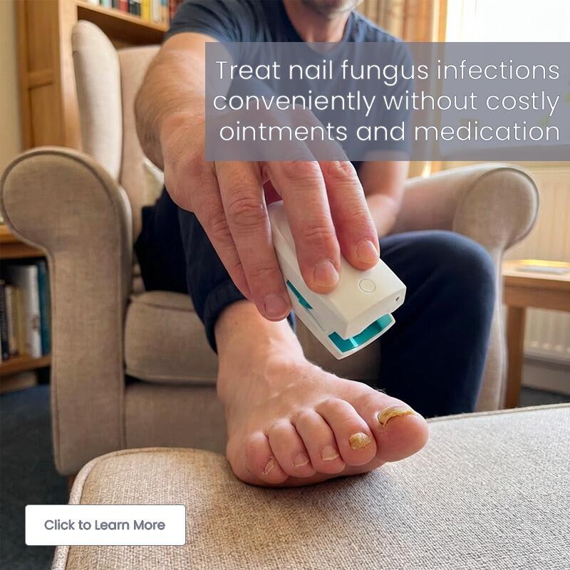 A middle aged man sitting in his lounge using the Lifemax Laser Nail Treatment to tackle a nail fungus infection.  The treatment is addressing the fungus problem conveniently and quickly without the need for expensive medication or ointments.