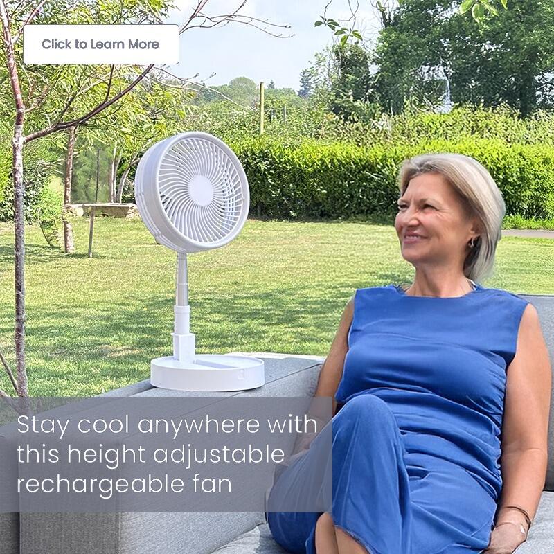 Smart lady on a sofa enjoying a cool breeze from a Lifemax Rechargeable Folding Fan