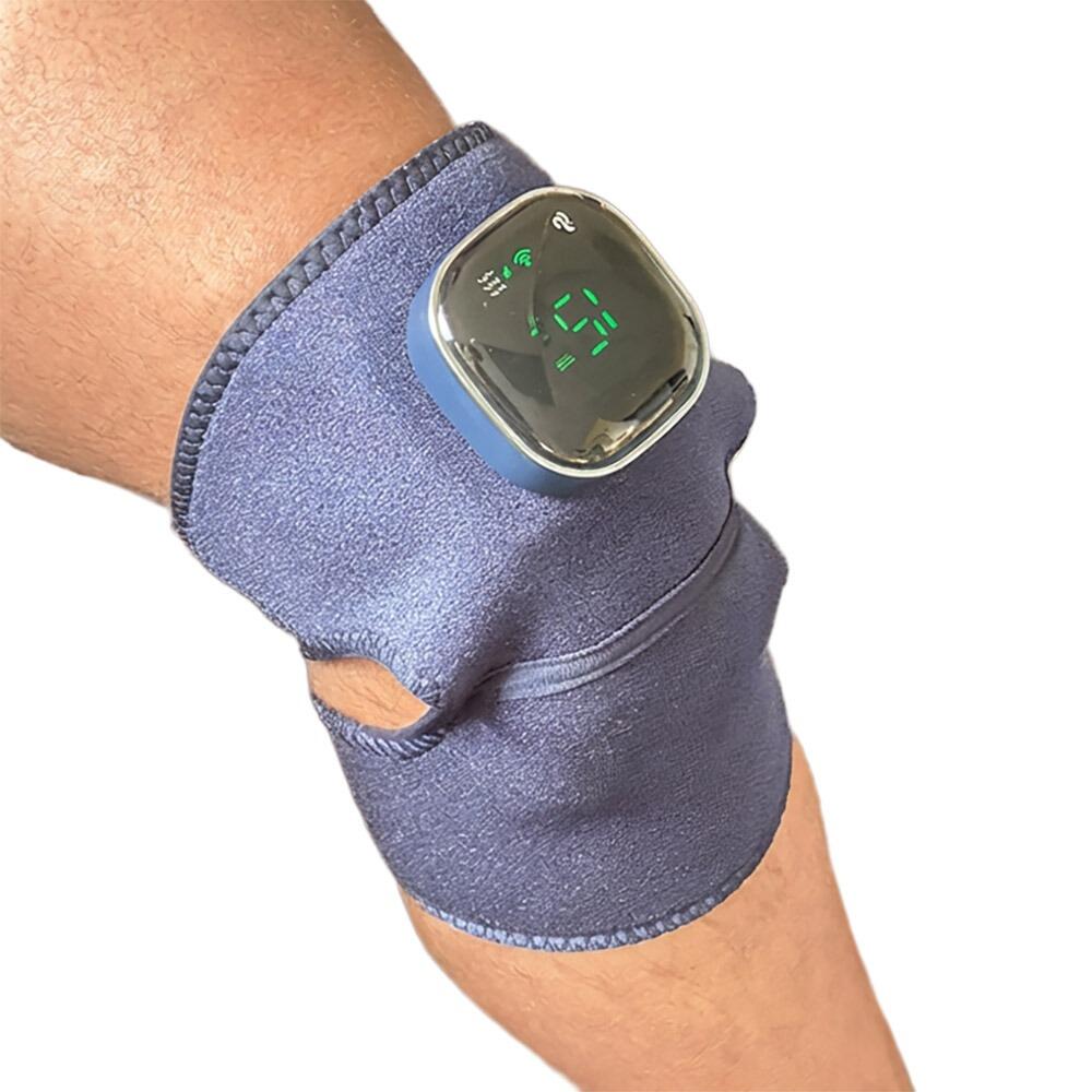 Lifemax 3 in 1 Heated Vibration Massager being worn on a mans knee showing 15m left on the timer