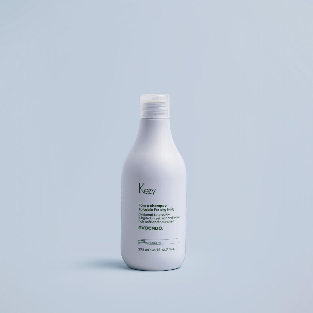 Avocado Shampoo 375ml bottle on a blue background
