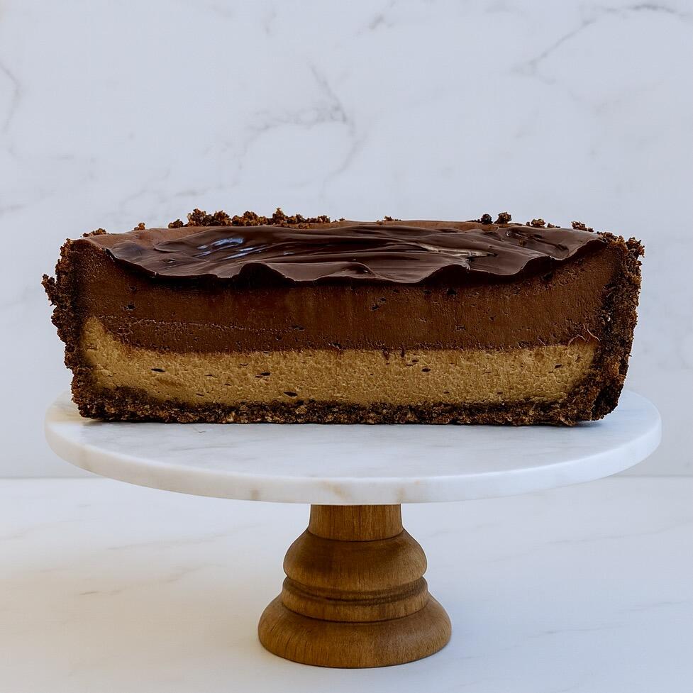 Malt caramel chocolate cheesecake slice showing layers