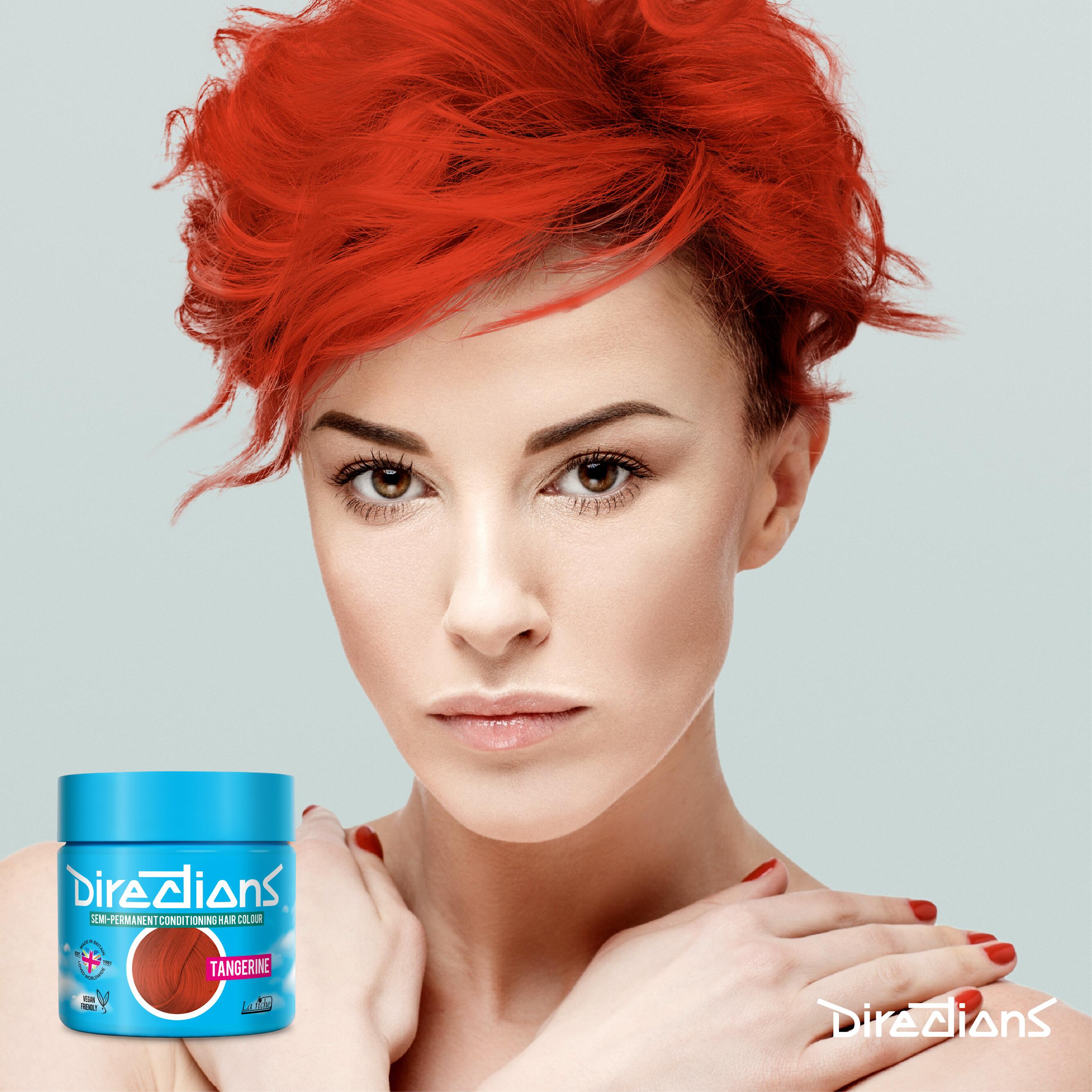 Tangerine directions hair dye colour on a model with short hair