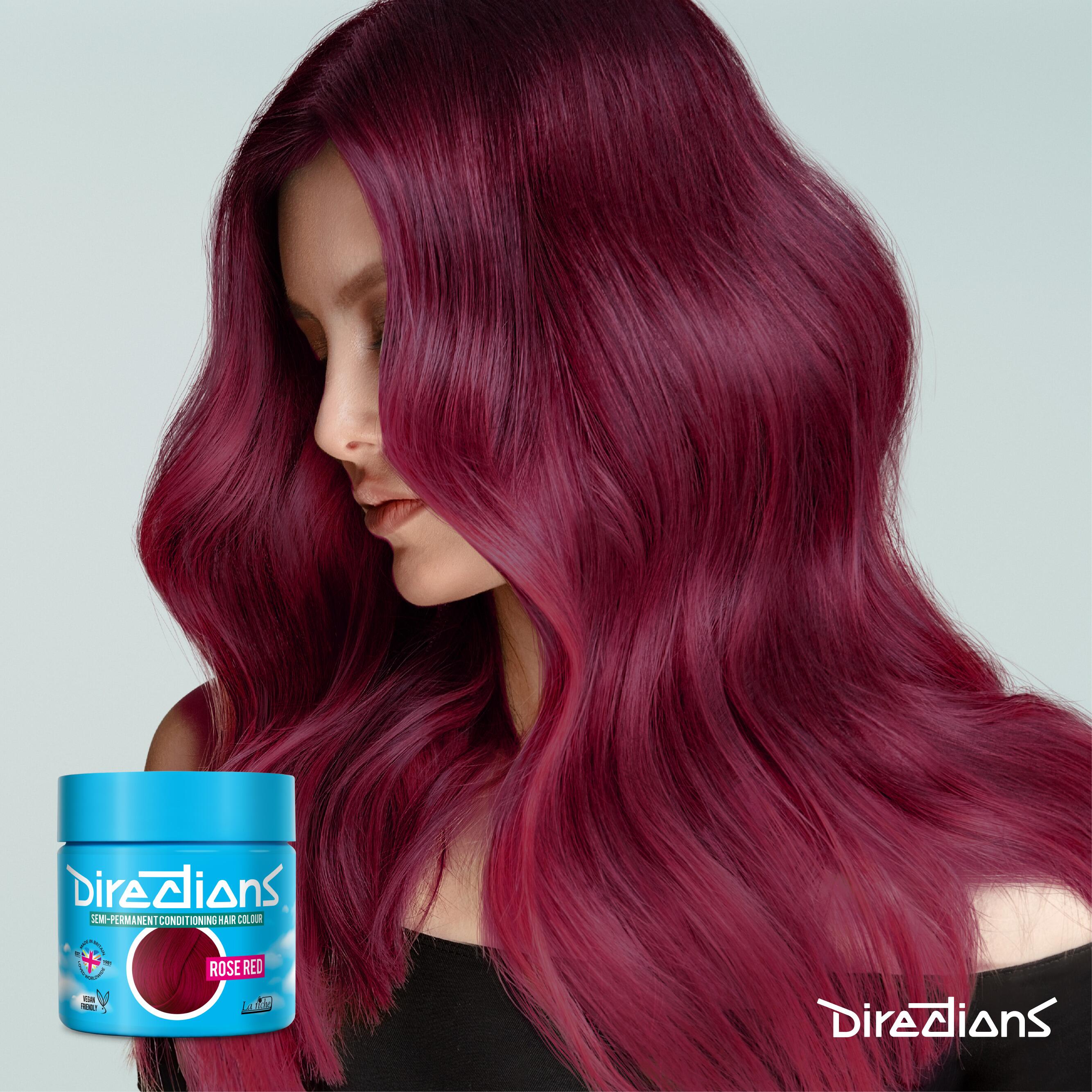 Rose red directions hair dye colour on a model with long hair