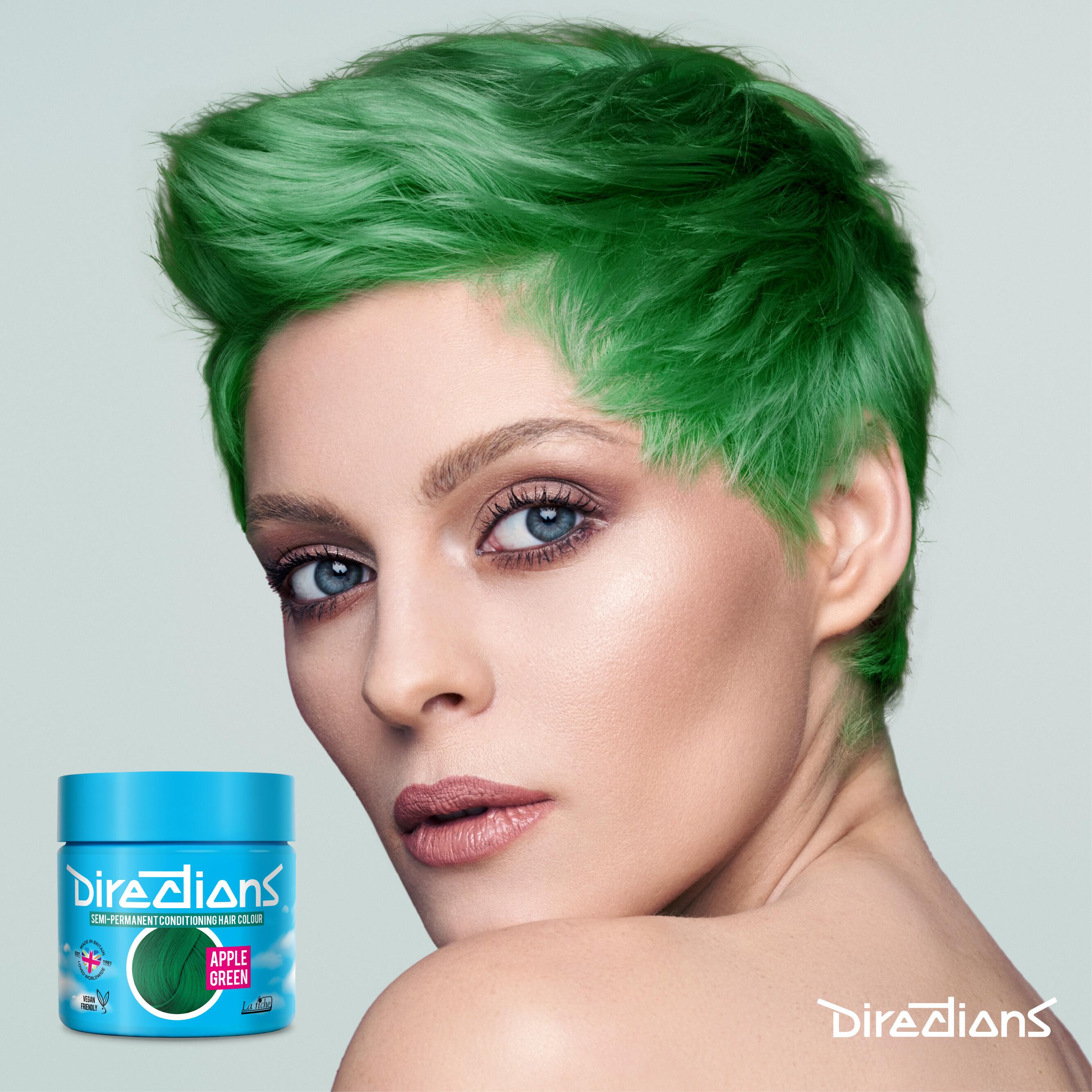 Apple green directions hair dye colour on a model with long hair