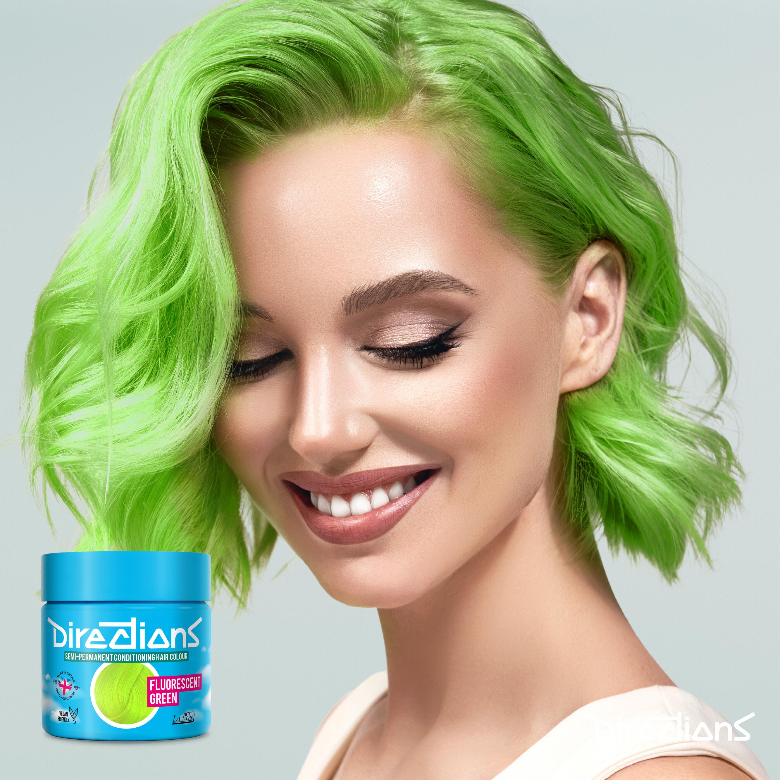 fluorescent green directions hair dye colour on a model with long hair