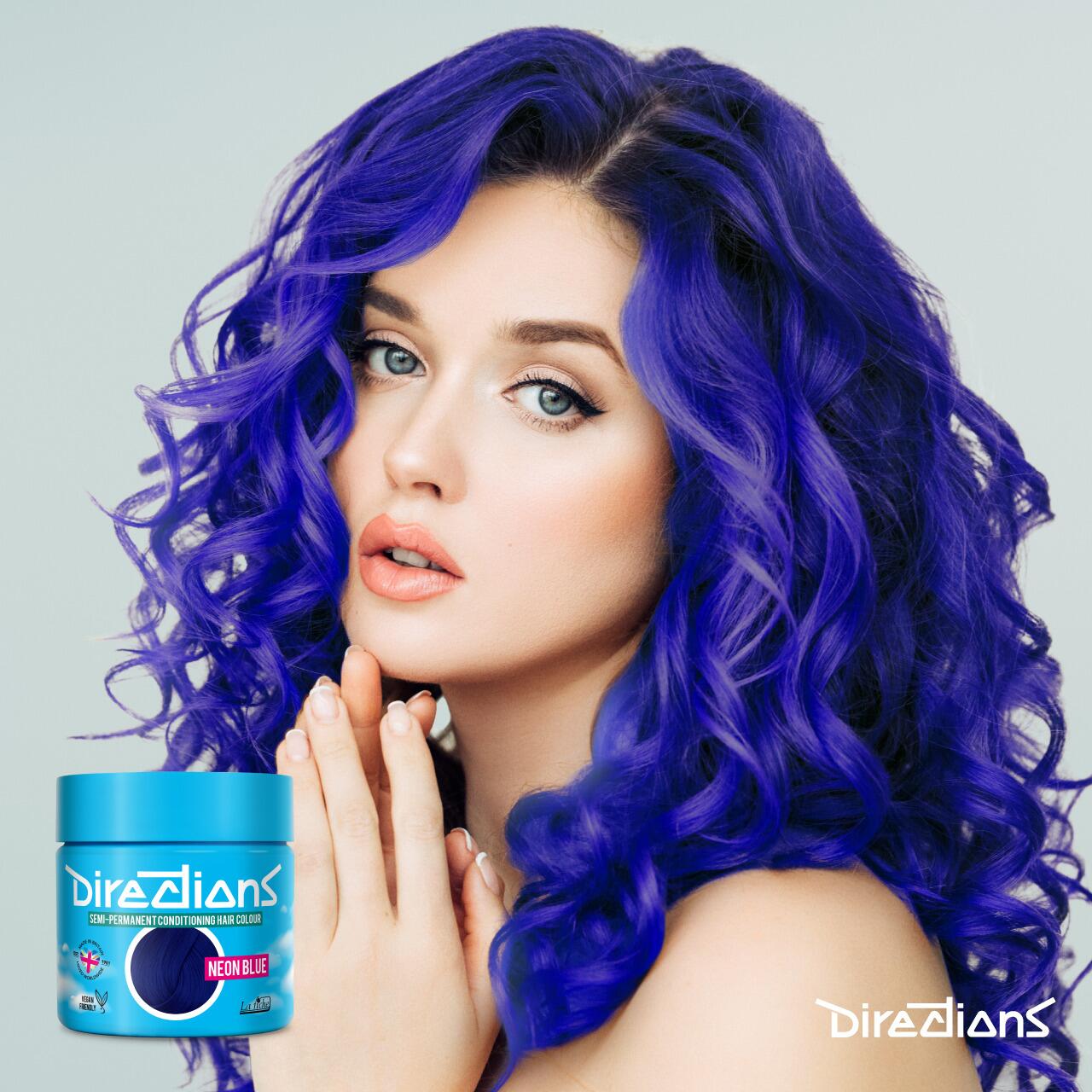 Neon blue directions hair dye colour on a model with long hair
