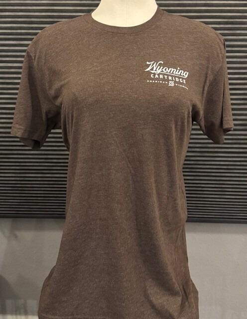 front of brown t-shirt with Wyoming Cartridge Co logo on the upper left side