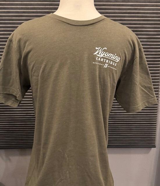 front of army green t-shirt with Wyoming Cartridge Co logo on the upper left side