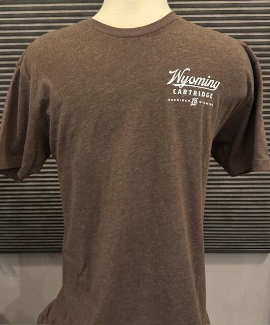 front of brown t-shirt with Wyoming Cartridge Co logo on the upper left side