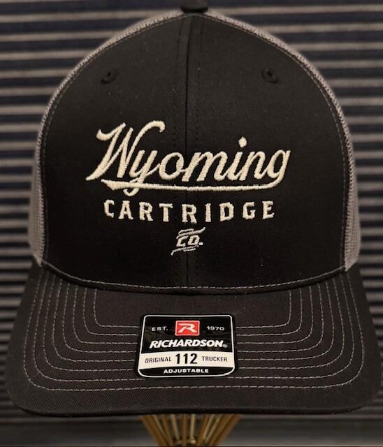 black front panel and bill of hat with Wyoming Cartridge Company logo centered on panel