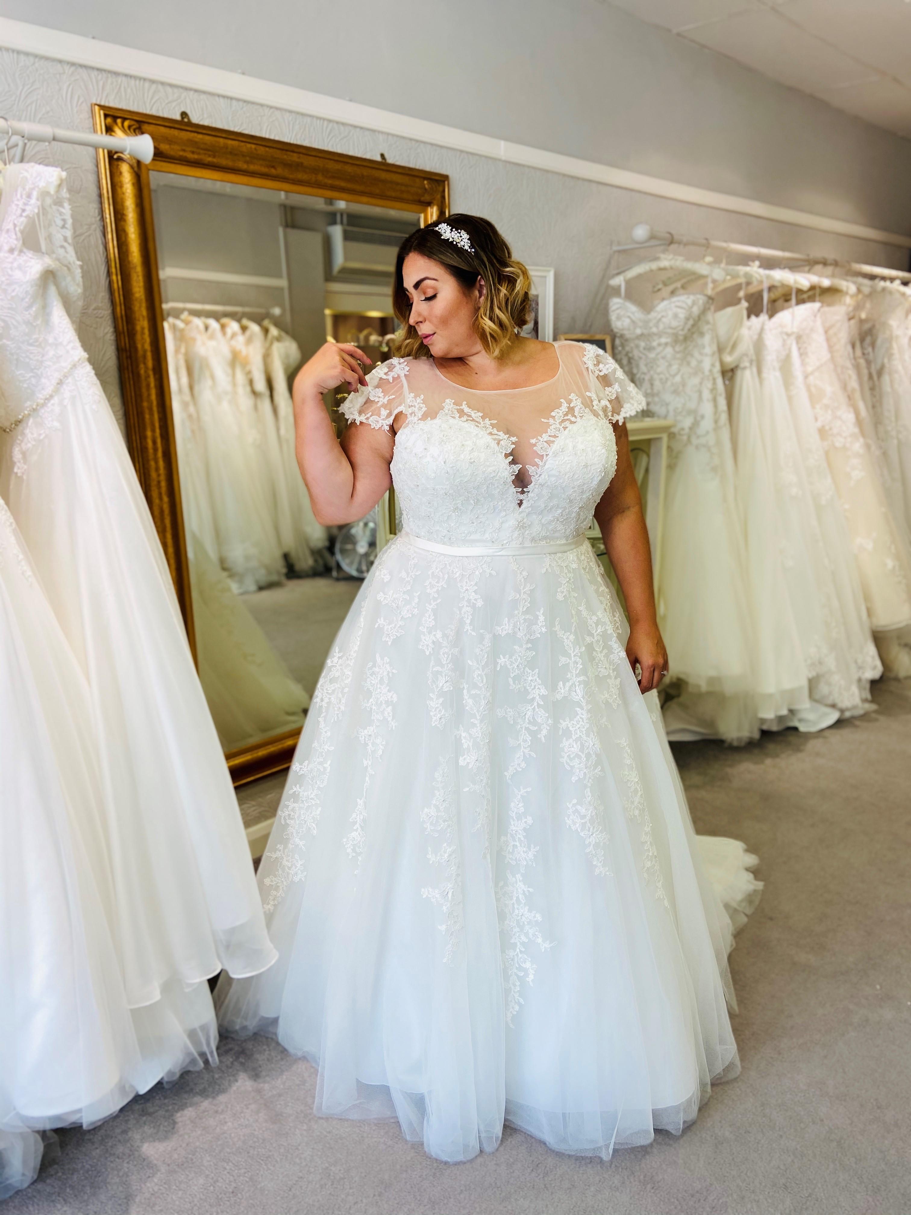 What Wedding Dress Style Best Suits A Plus Size Bride Who Doesn t