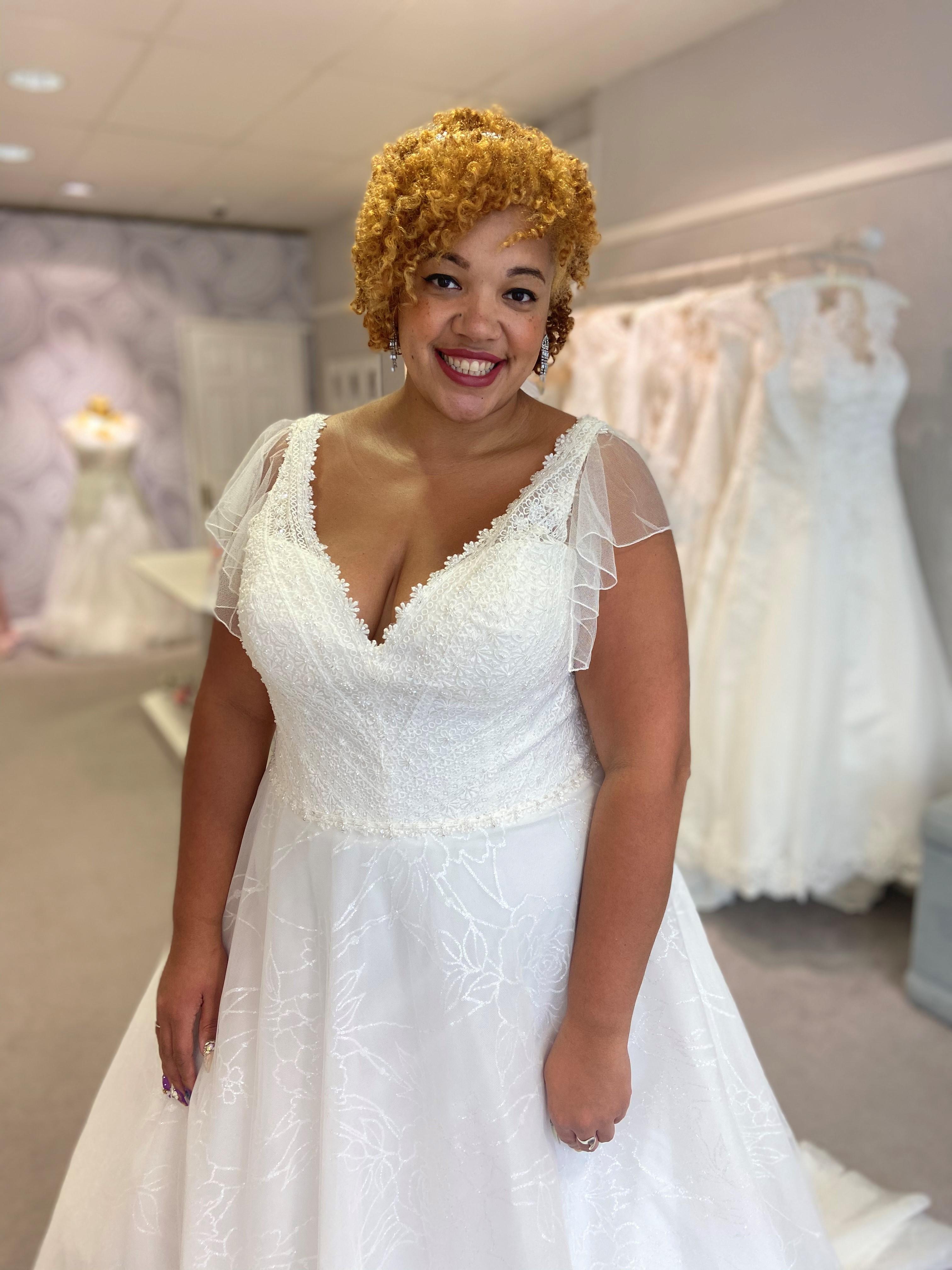 What Wedding Dress Style Best Suits A Plus Size Bride Who Doesn t