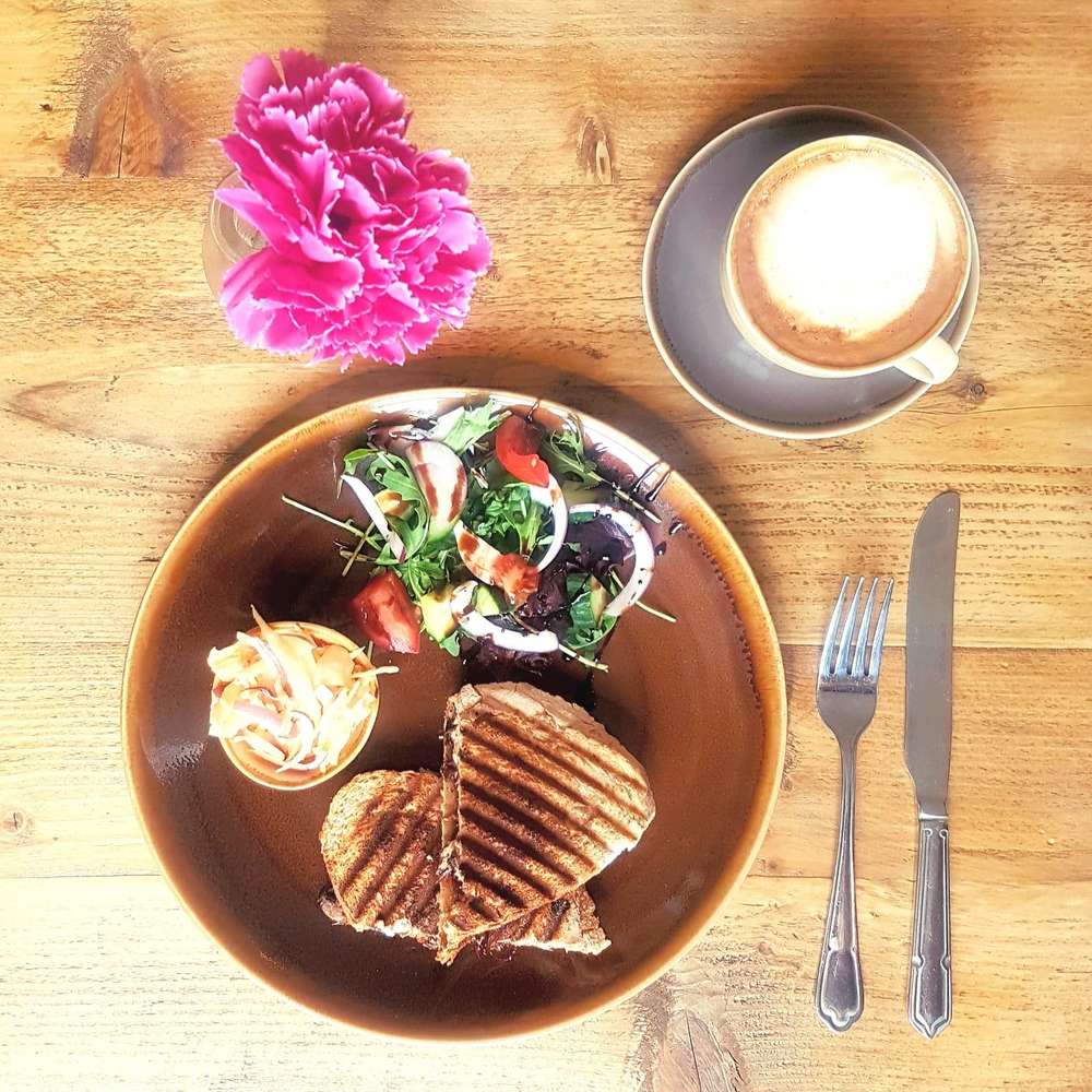 Delicious toastie coleslaw and salad with coffee at Lemana