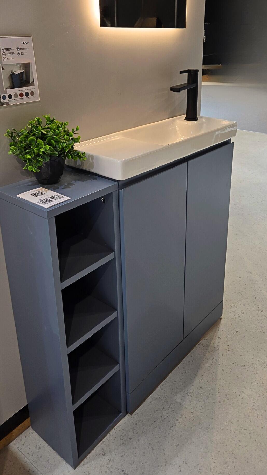 Compact cloakroom vanity unit with storage drawers and wall-hung design