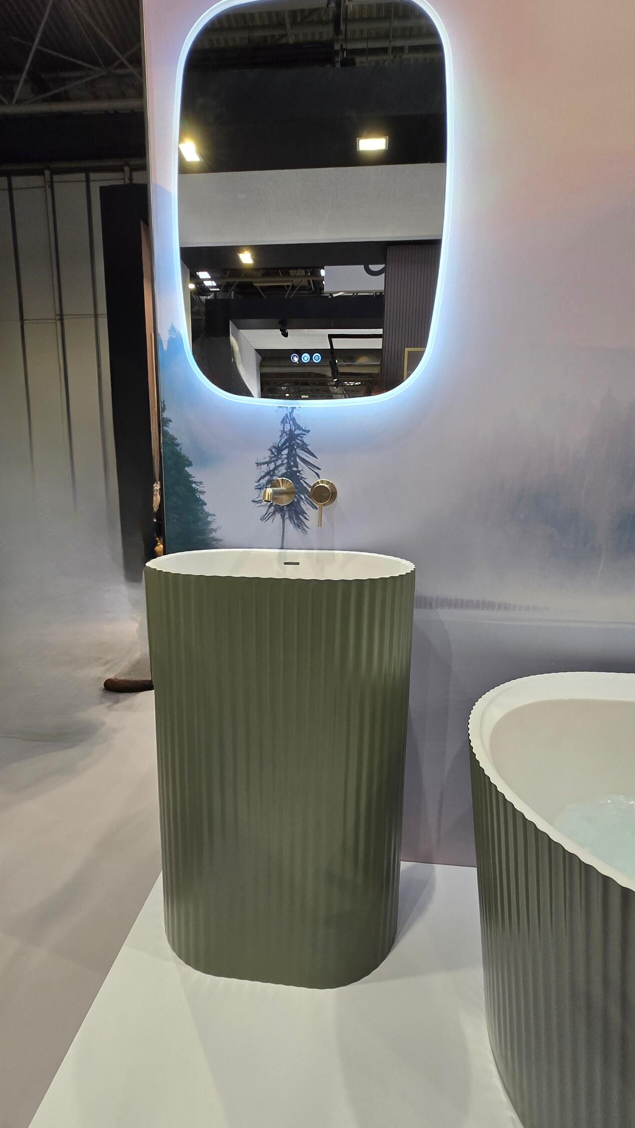 Spa-style UK bathroom with soft lighting, warm towels and a calm, minimal finish