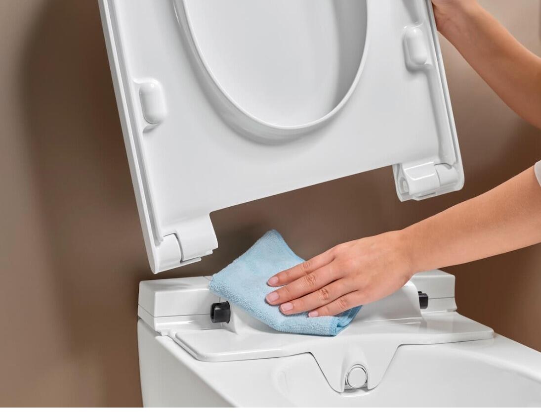 AquaClean Alba bidet toilet with lid open showing rimless pan