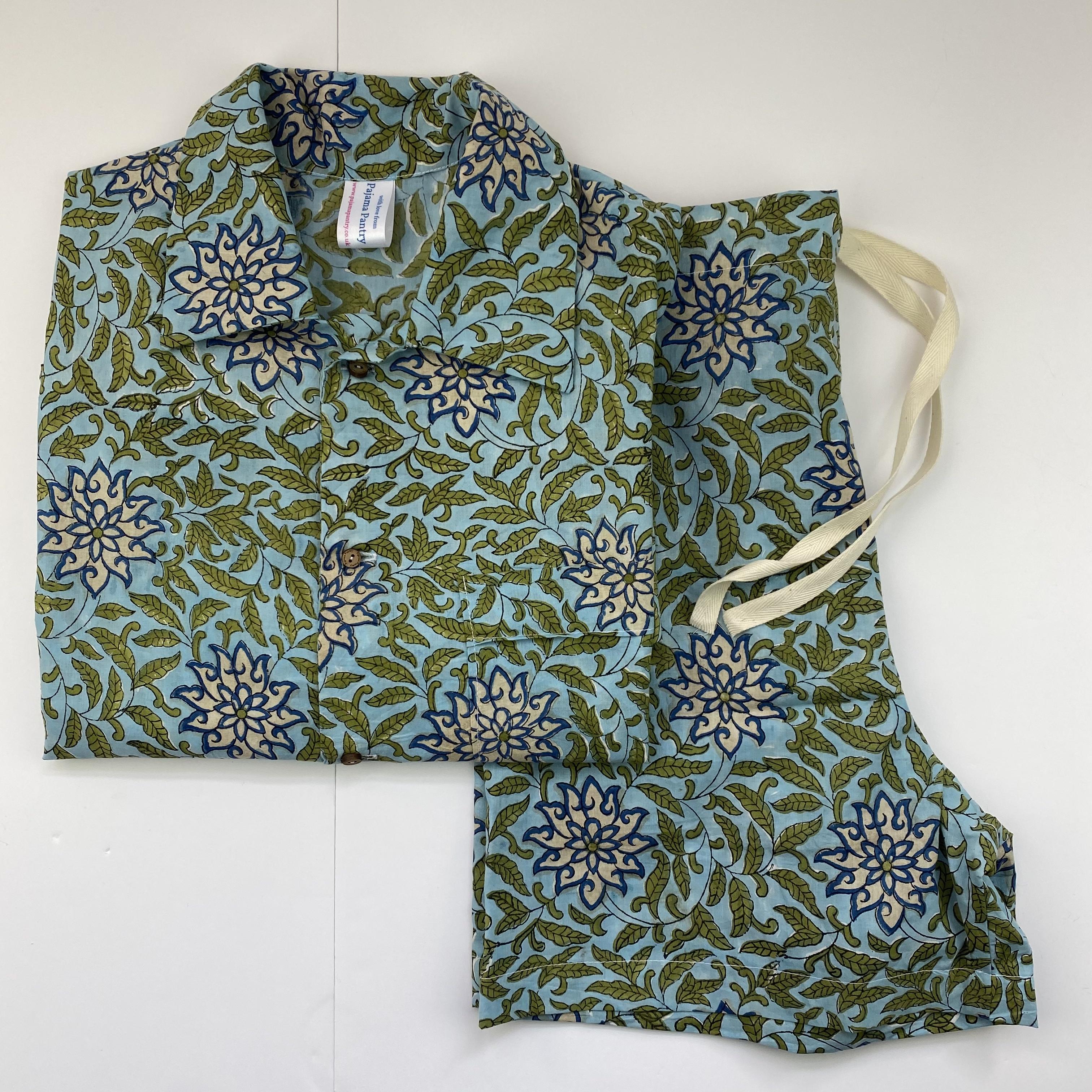 Turquoise starflower matching cotton pajama shorts set, shorts folded sideways