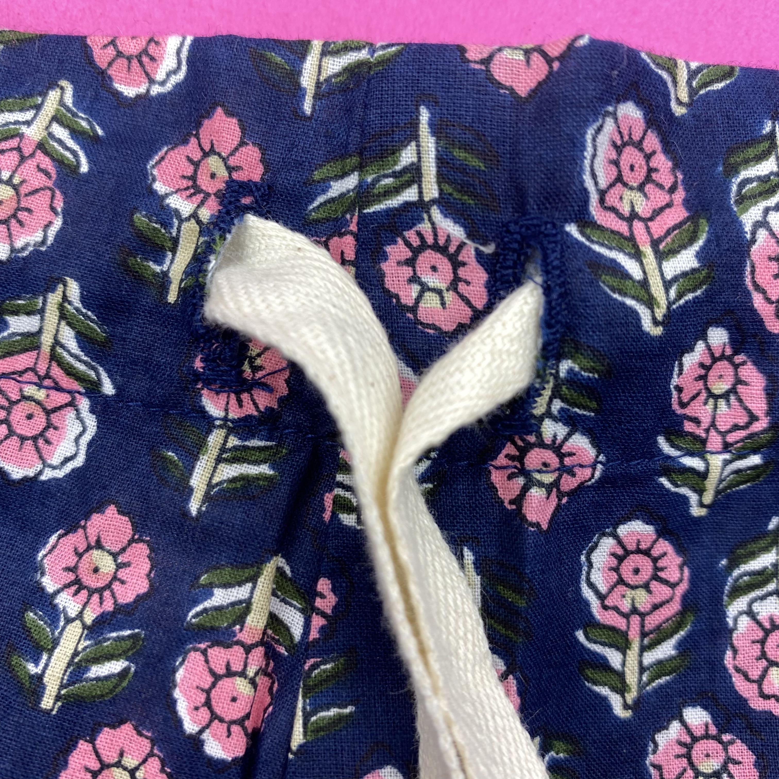 Navy cotton pj pants with tiny pink daisy motif