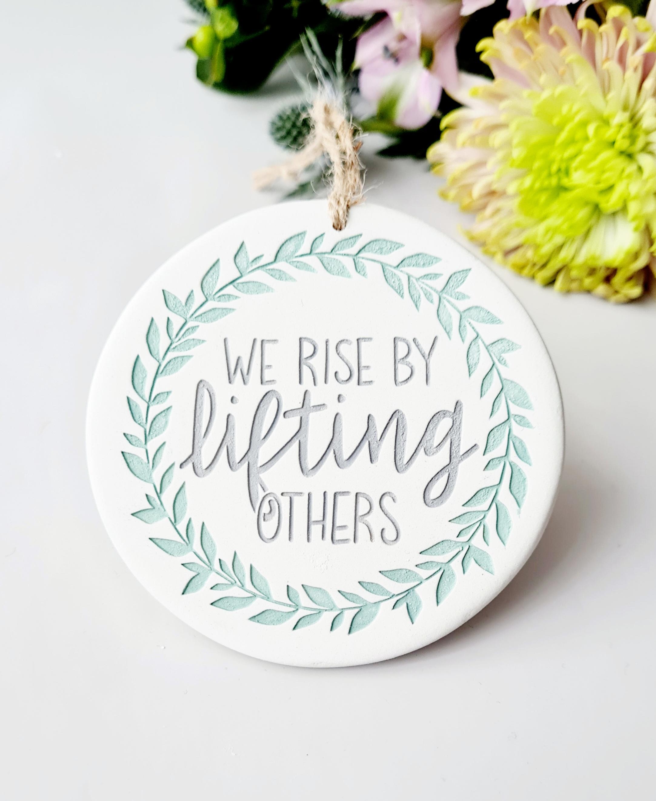 We rise by lifting others - inspirational quote decoration