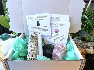 Crystal gift box with sage stick, selenite ruler, raw rose quartz and rough black tourmaline, the holistic hamper crystals UK