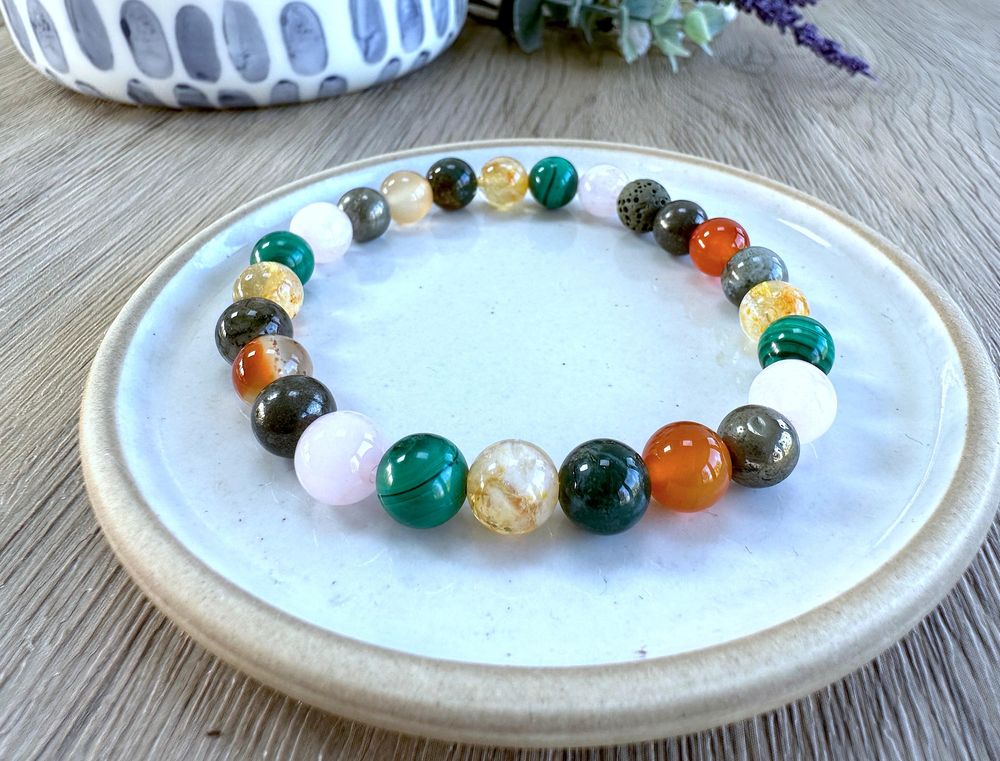 Fibromyalgia chronic illness crystal bracelet in oranges, greens and golds