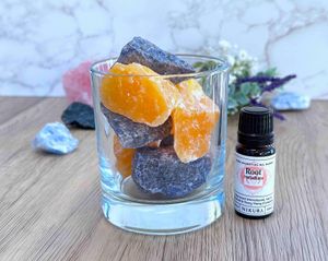 sodalite and orange calcite crystal diffuser with root chakra essential oil blend