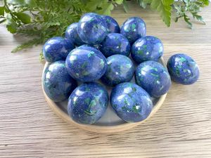 blue green azurite malachite crystal tumble stones on a dish