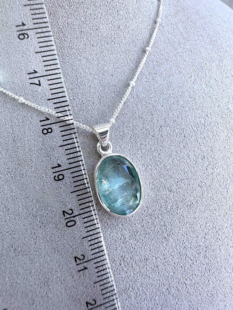 green kyanite oval sterling silver pendant with optional chain showing ruler for size