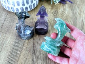freestanding crystal animal dolphin in fluorite and green moss agate