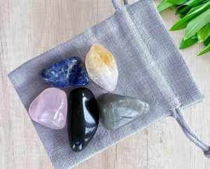 scorpio crystals set with five tumbled stones and a grey cotton gift bag