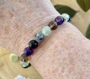 Labradorite, Amethyst, Beaded Crystals of Black Obsidian, Prehnite & Smokey Quartz in this Empath Protection Beaded Crystal Bracelet displayed on wrist