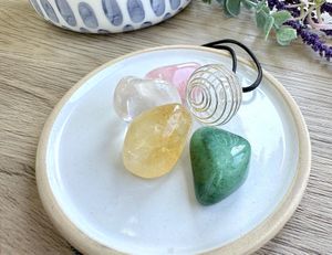 Good vibes self love crystal set with four tumble stones and a wire pendant necklace