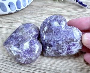 two purple lepidolite puff crystal hearts 5cm in size