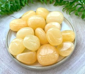 Orange calcite healing crystal tumble stone for positivity, The Holistic Hamper, online crystal shop UK