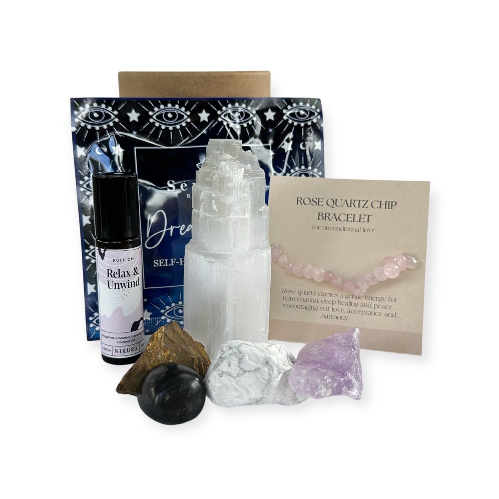 time to rest crystal pamper pot gift set with eye mask, selenite tower, rose quartz bracelet, shungite tumble, lava tumble and 3 rough stones