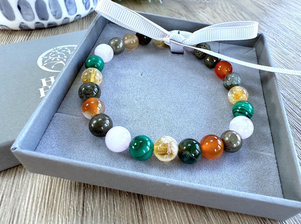 Fibromyalgia chronic illness crystal bracelet in oranges, greens and golds