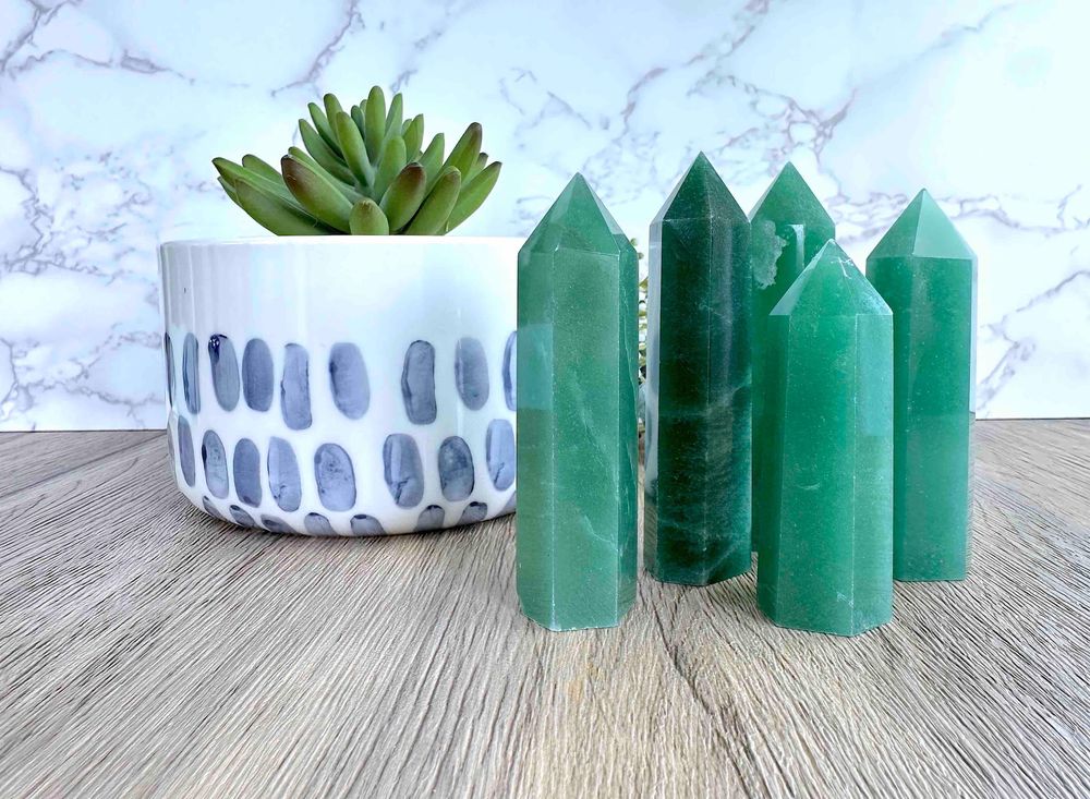 green aventurine crystal towers in a group from the holistic hamper