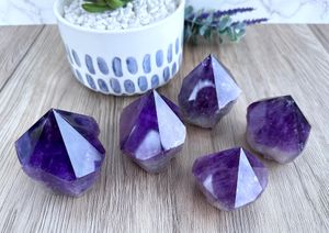 five deep purple amethyst points