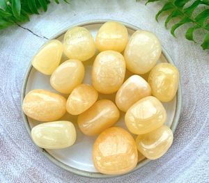 Orange calcite healing crystal tumble stone for positivity, The Holistic Hamper, online crystal shop UK