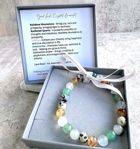manifesting good luck crystal bracelet with Dalmatian jasper, moonstone, rutiliated quartz, citrine and aventurine in box